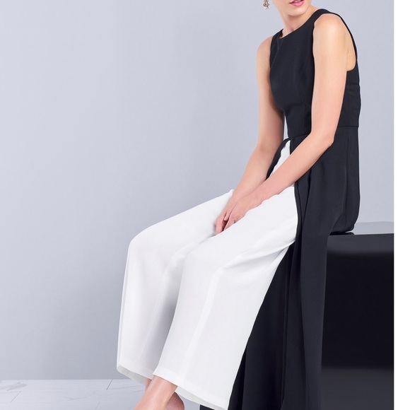 Adrianna Papell Pants - COPY - Crewneck; hidden back zipper with hook-and-eye closure
Skirt overlay wit…